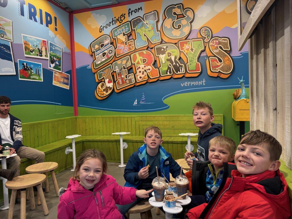 image of 4 kids eating icecream at ben and jerrys factory