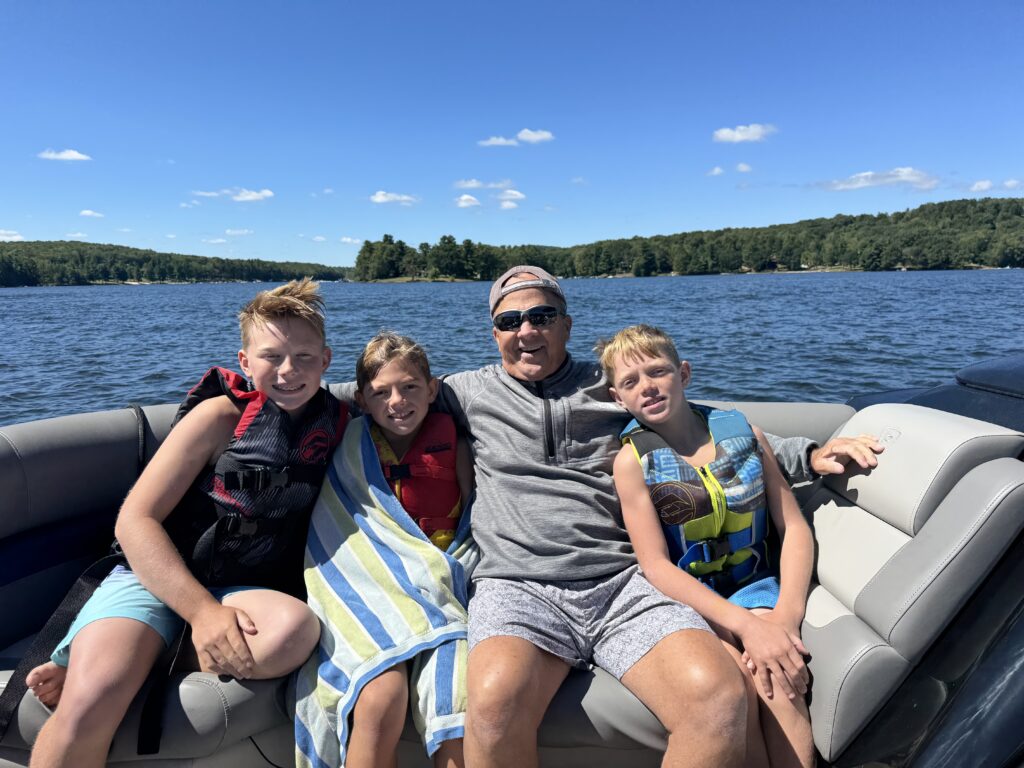 fam on boat enjoying deep creek lake