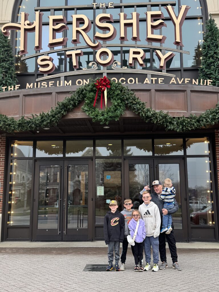 family standing outside hershey story museum