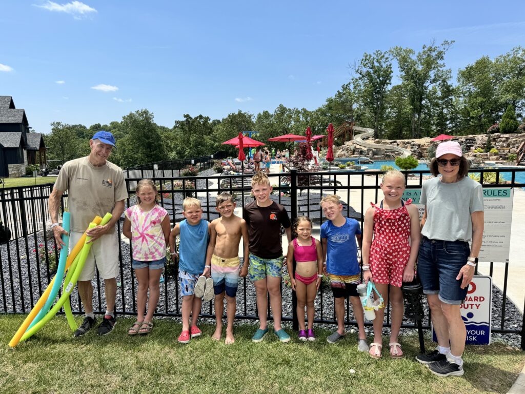 family at serenity shores pool, table rock lake with kids summer vacation