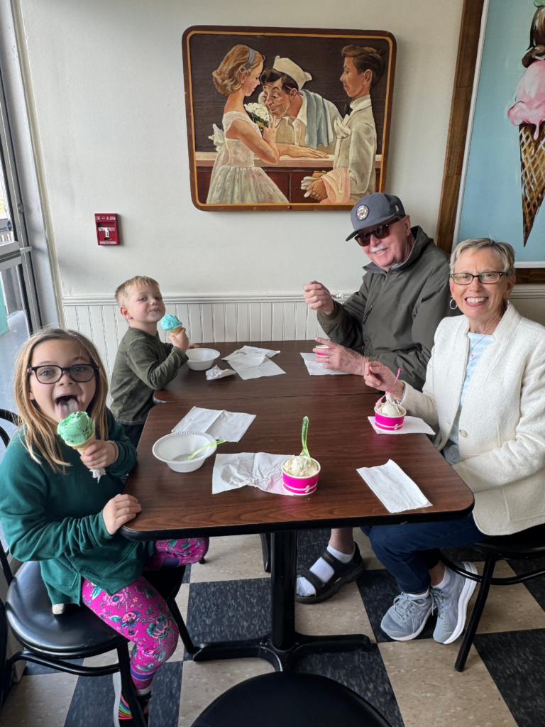 Family eating ice cream at anna maria island beach vacation