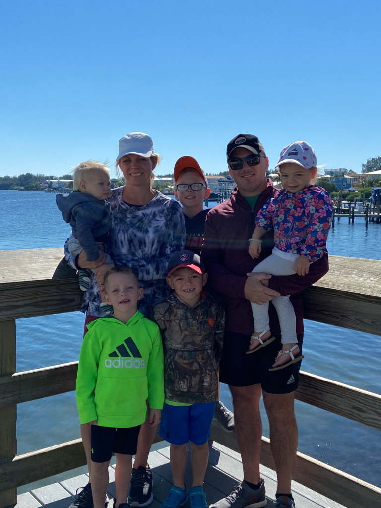 family on bridge street pier bradenton beach anna maria island family vacation