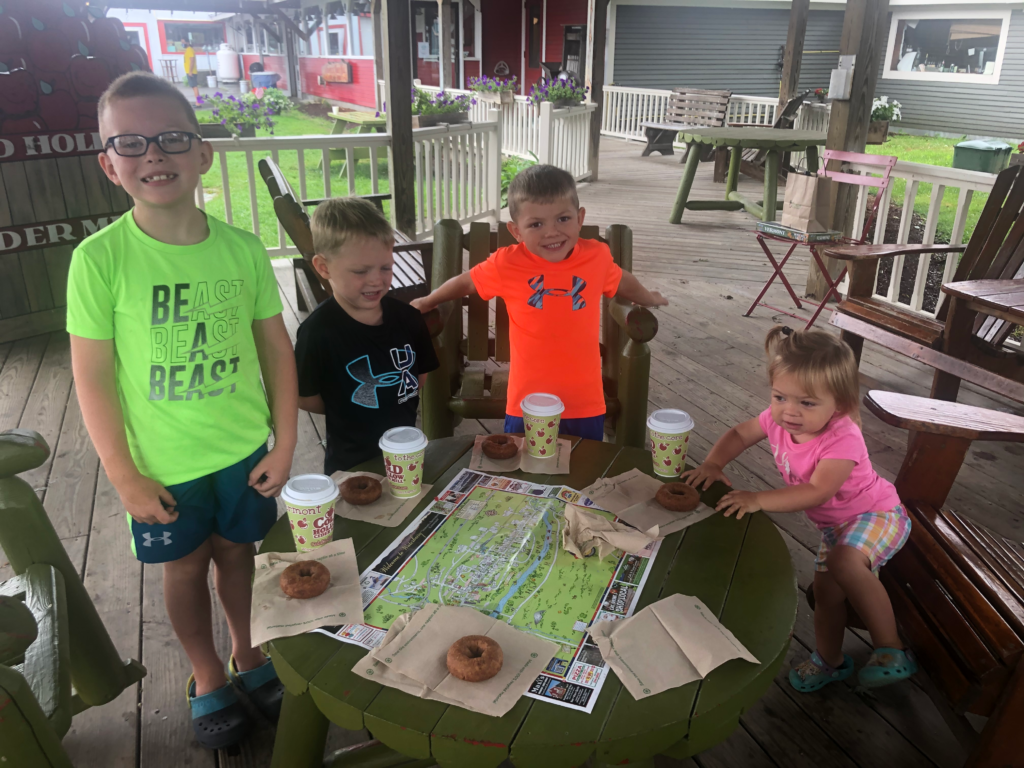 children at stowe hollow cider mill stowe vermont during summer
