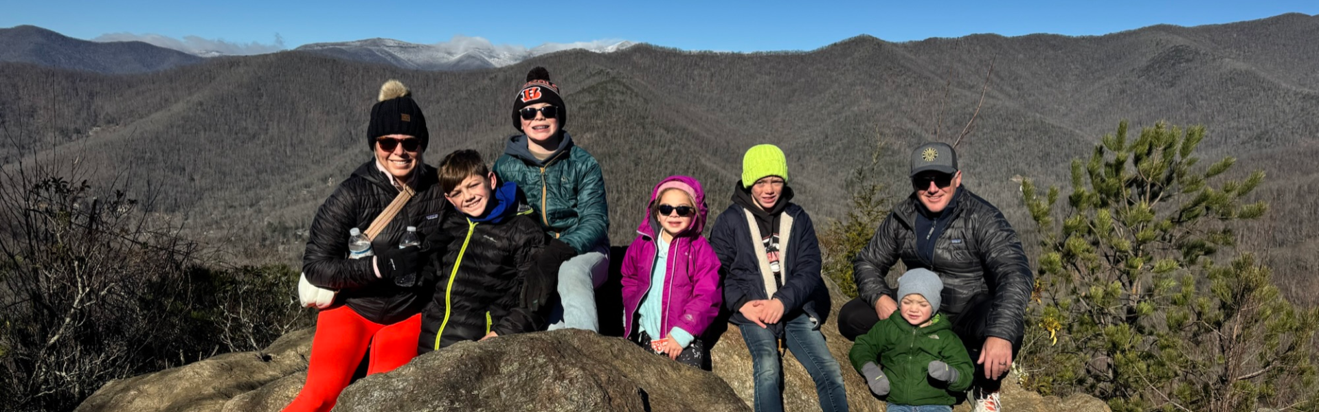 family at top of lookout mountain in montreat, north carolina