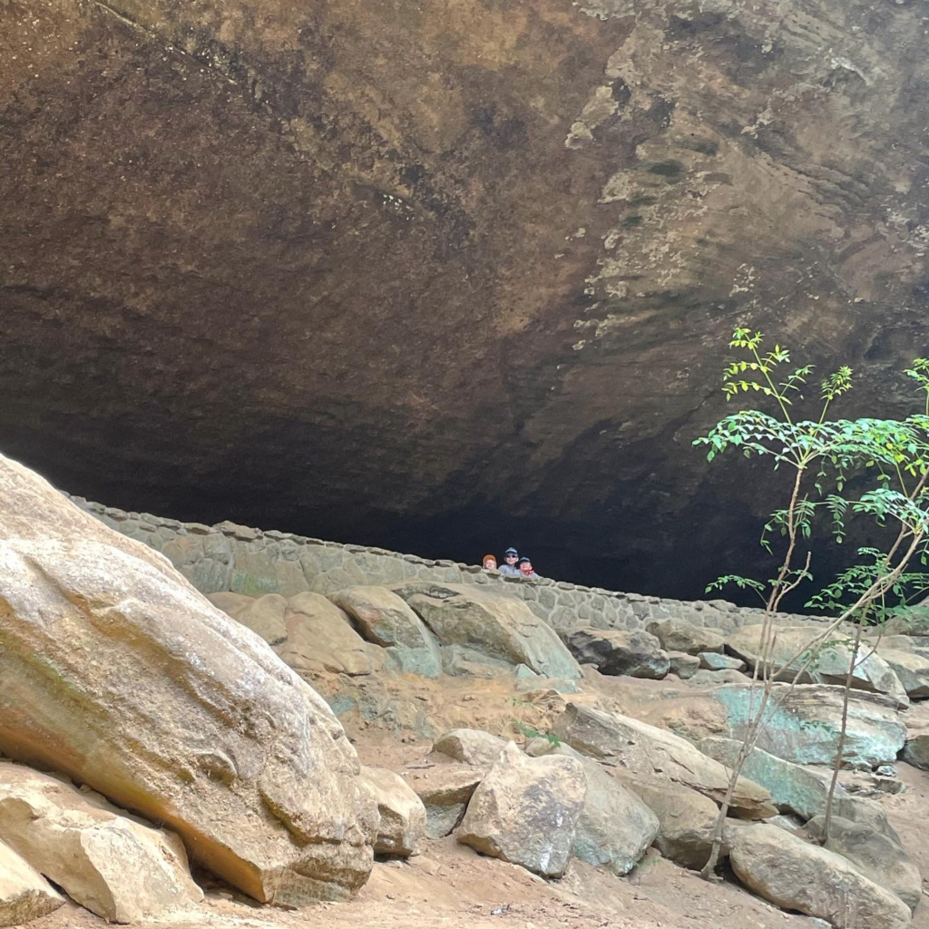 children in old mans cave at old mans cave state park in hocking hills ohio