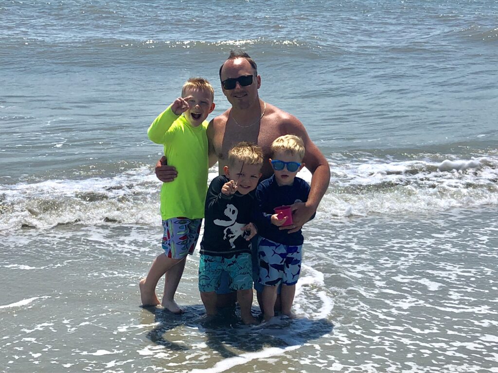dad and boy at beach in wild dunes isle of palms south carolina 