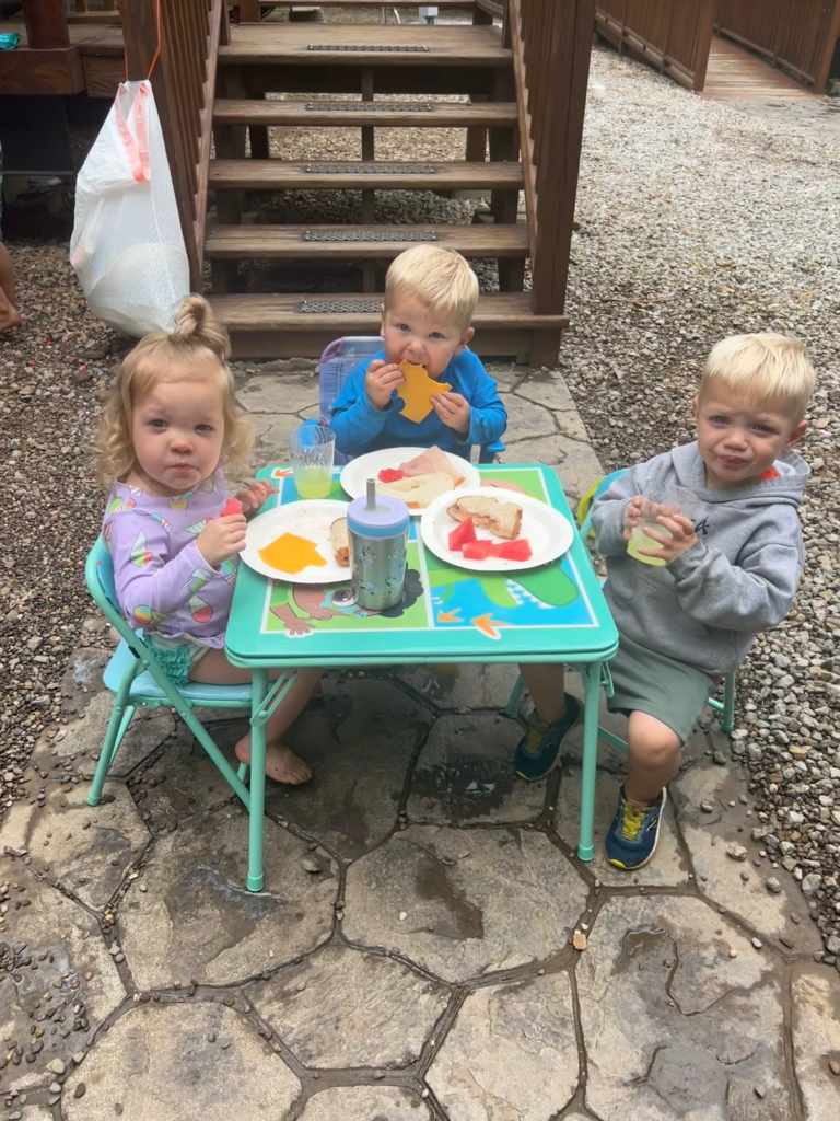 three little kids at picnic table austin lake campground steubenville ohio