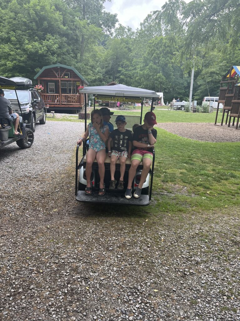 kids on golf cart at Austin Lake Campground, Steubenville, OH