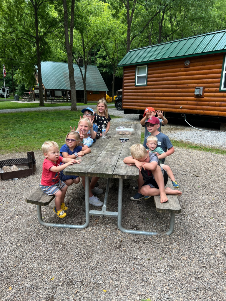 kids at picnic table austin lake campground, steubenville ohio