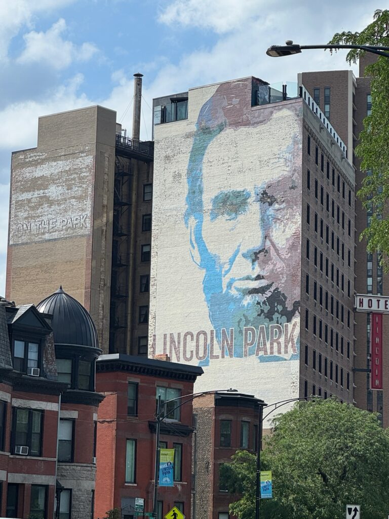 spend half day in lincoln pafk with kids. Cool building with Abraham Lincoln and Lincoln Park title
