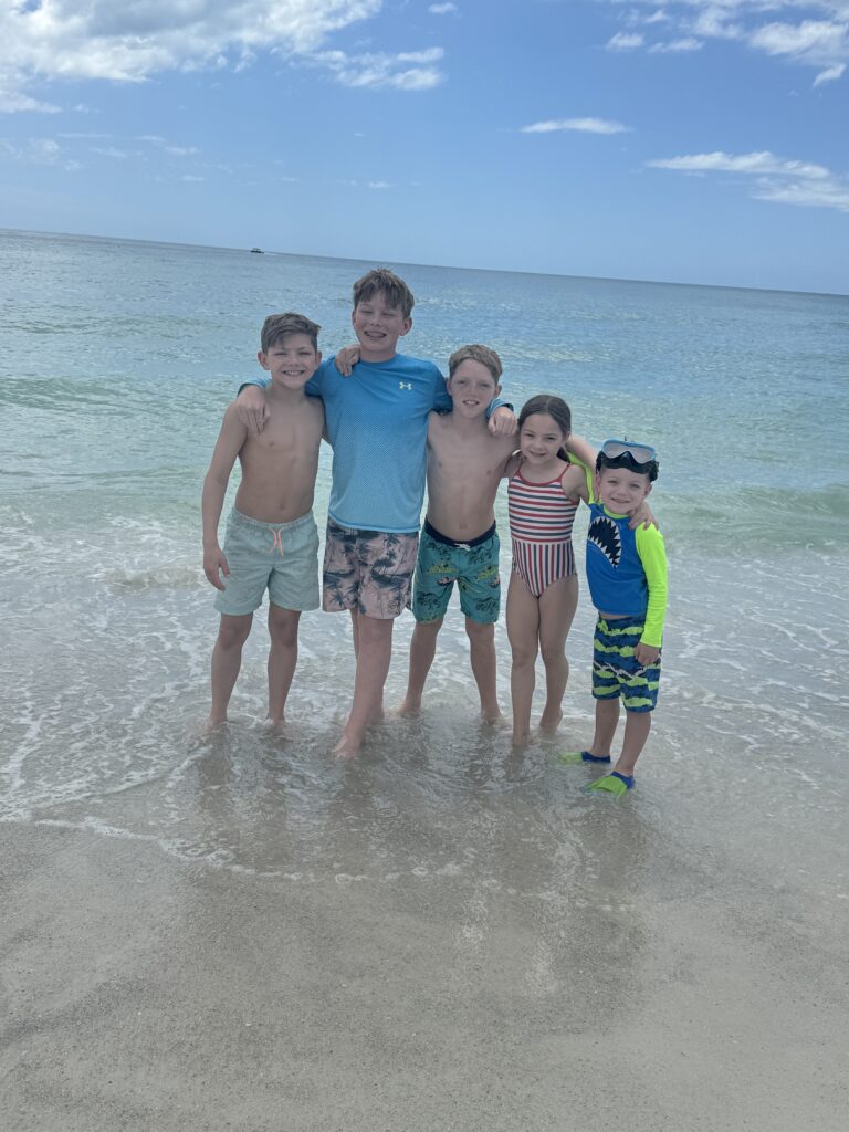 kids in water on anna maira island holmes beach